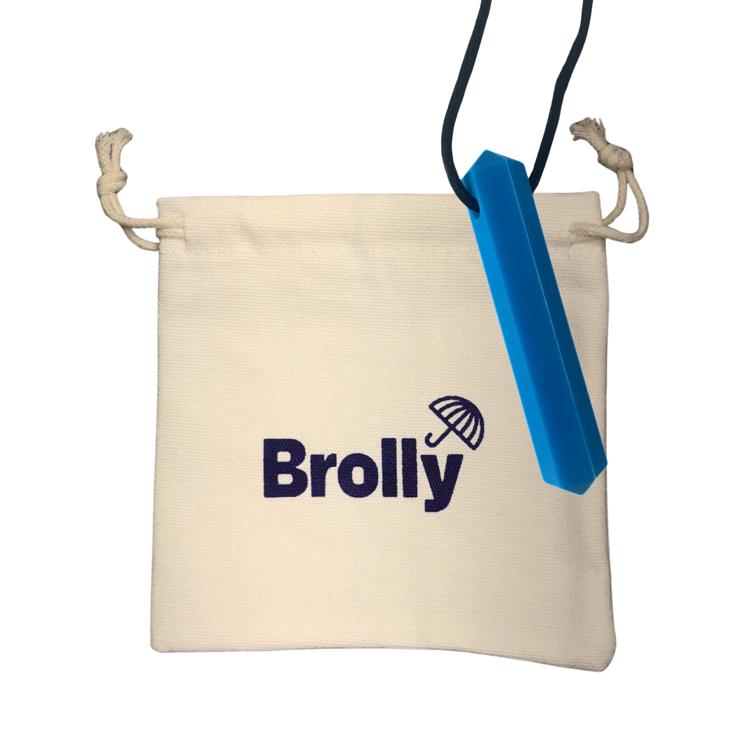 Beige drawstring pouch and Gem-shaped Brolly Sheet Chew Necklace on a black cord against a white background - Blue