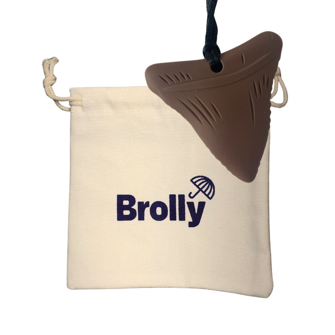 Beige drawstring pouch and Shark Tooth-shaped Brolly Sheet Chew Necklace on a black cord against a white background - Brown