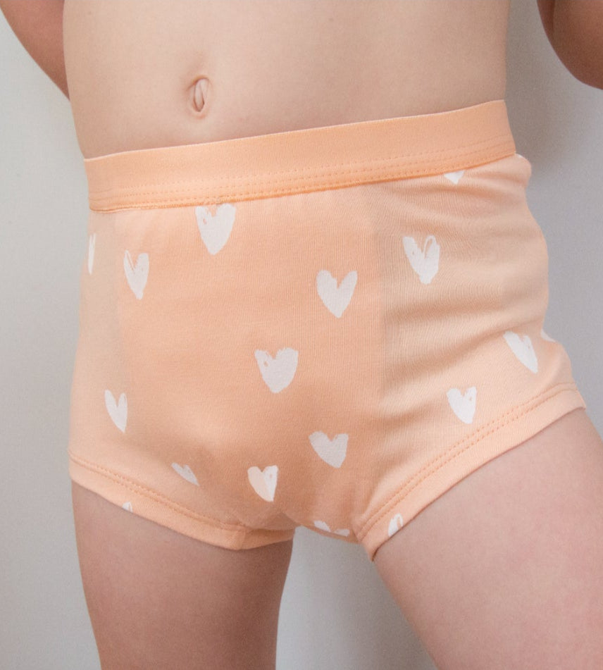 Child wearing Snazzi Pants Night Trainers - Sweet Hearts