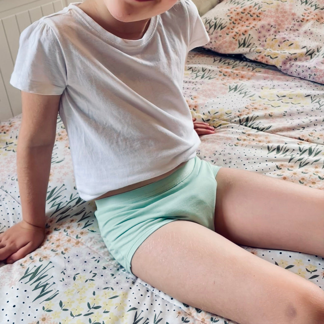 Children wearing Snazzi Pants Night Trainers - Moss Boss