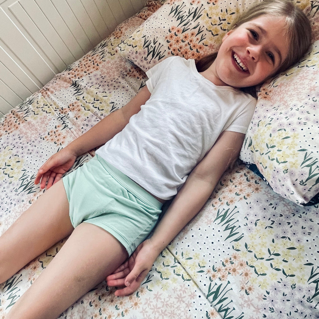 Children wearing Snazzi Pants Night Trainers - Moss Boss