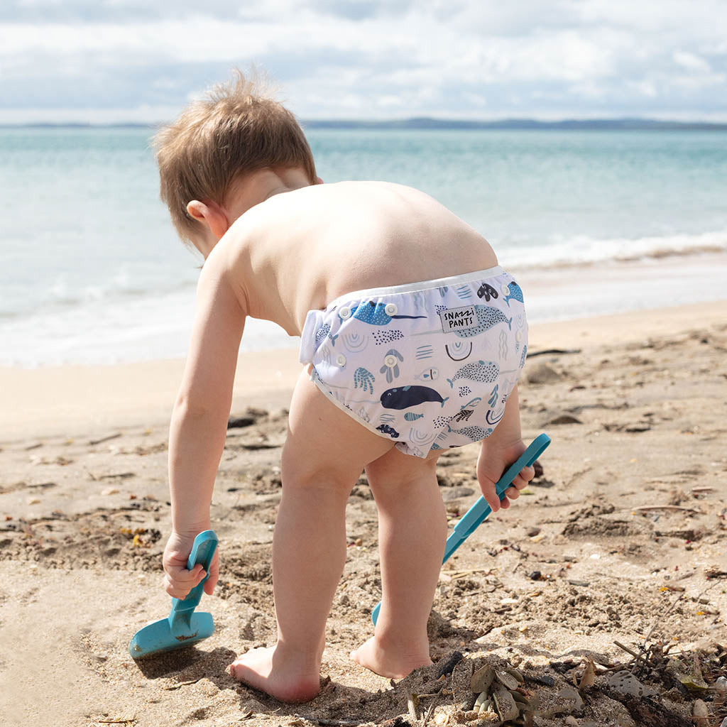 Child wearing Swim Nappy - Narwhales