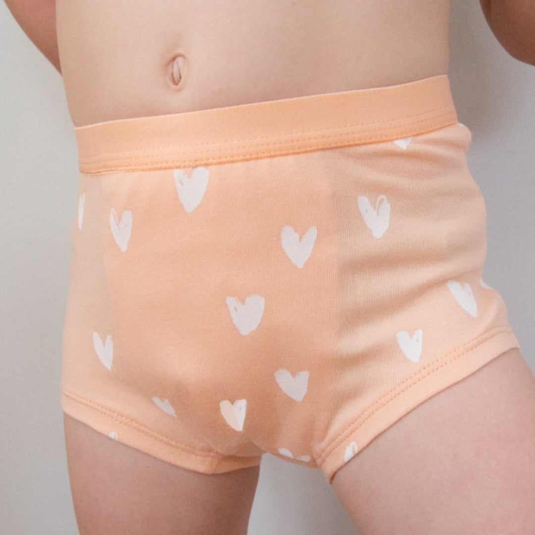 Child wearing Snazzi Pants Night Trainers - Sweet Hearts