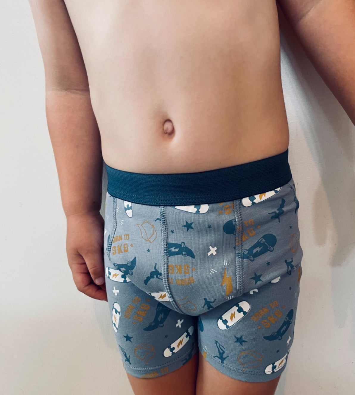 Child wearing Snazzi Pants Night Trainers - Skater