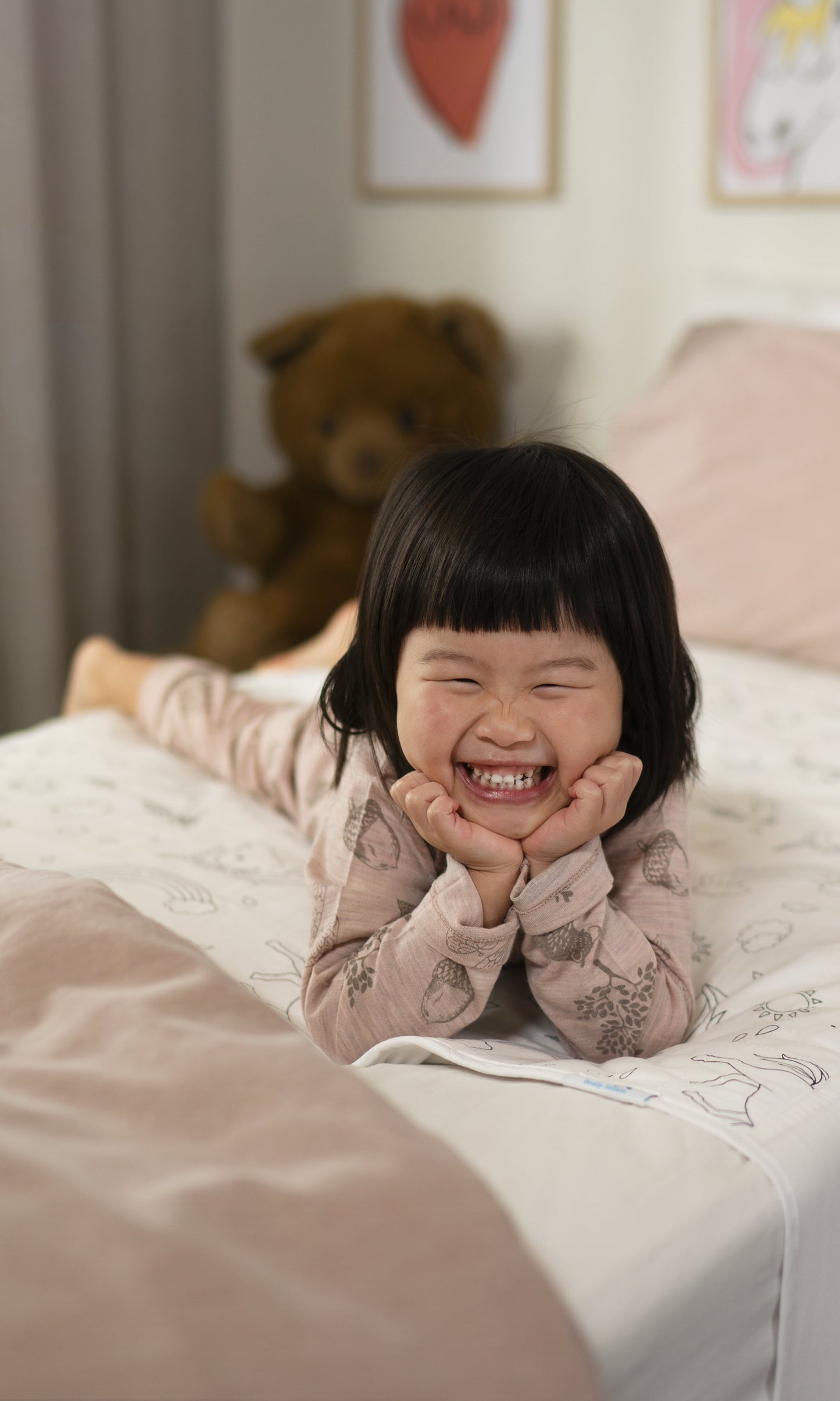 Child sitting on space time Brollysheet